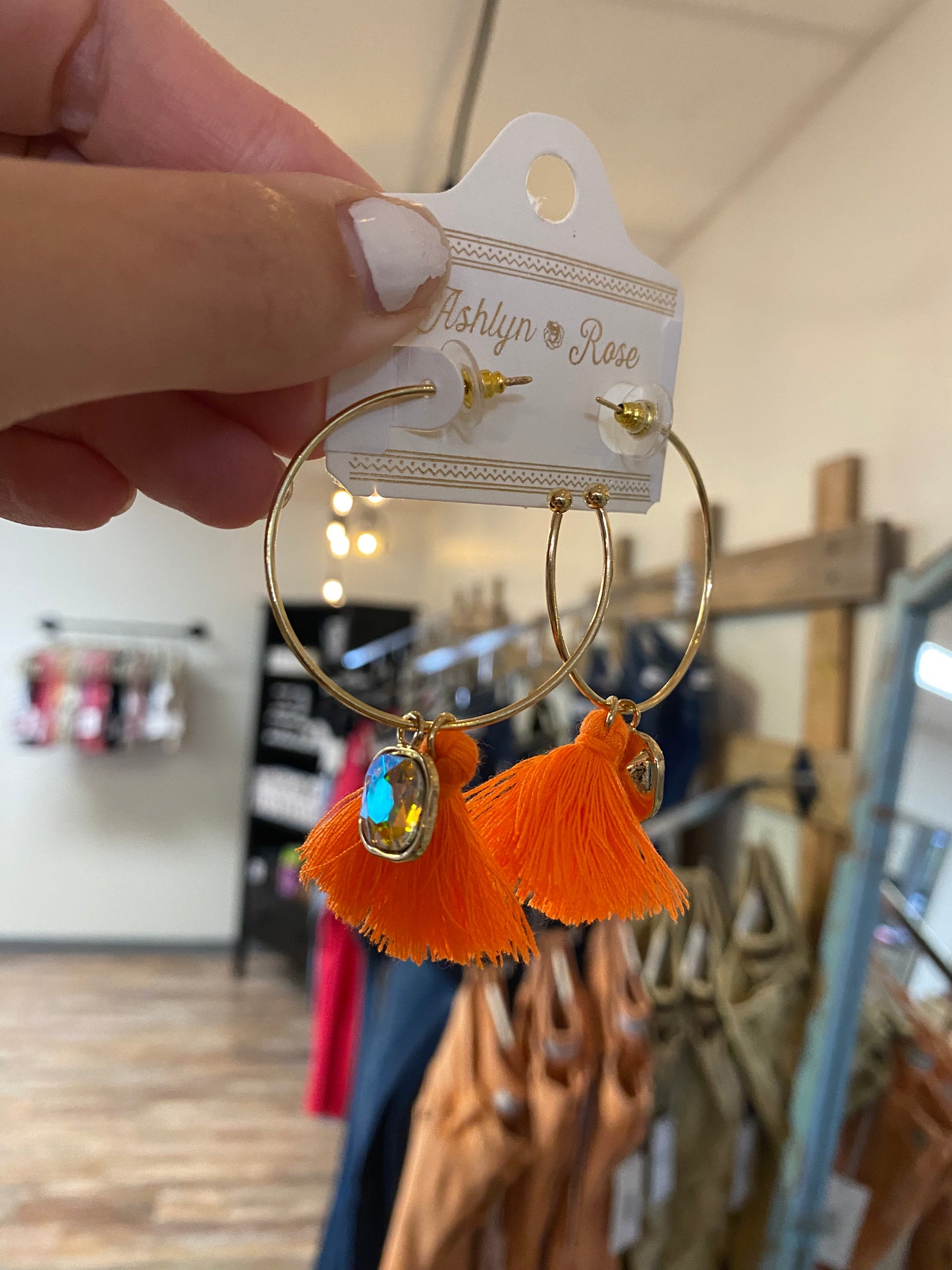 Loop Earrings With Orange Tassels