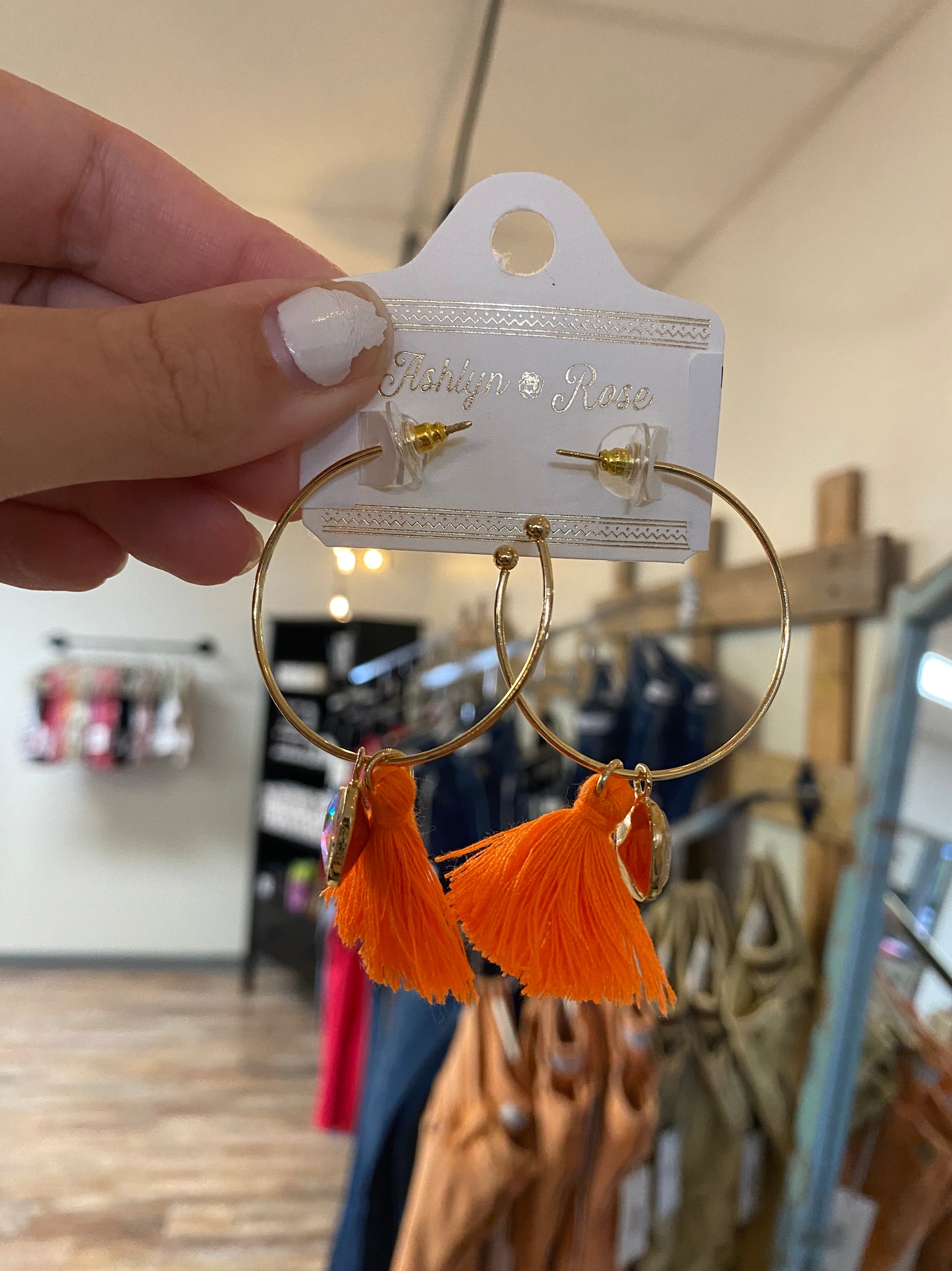 Loop Earrings With Orange Tassels